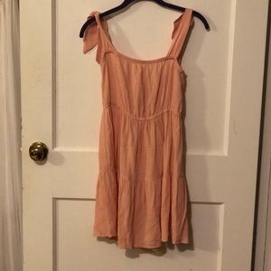 peach across the shoulder dress